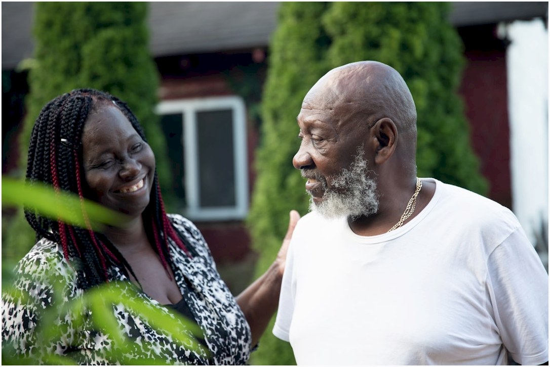 a man and woman smiling
