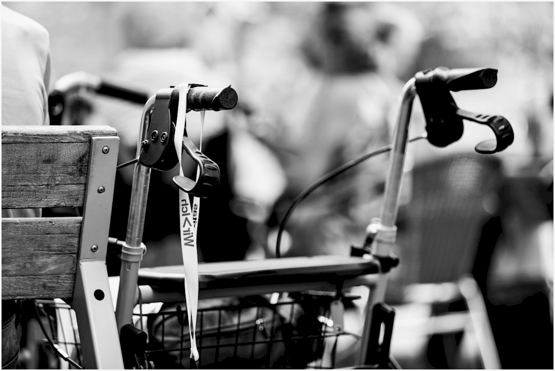 a black and white photo of a bicycle with a basket