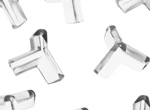 Protetores de quina transparentes de silicone para móveis; imagem de produto da Colombo.